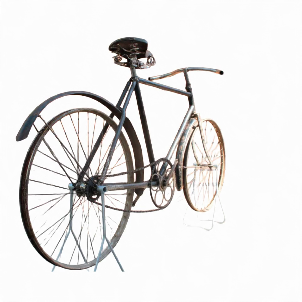 Antique bicycle before restoration — patinated, missing tyres